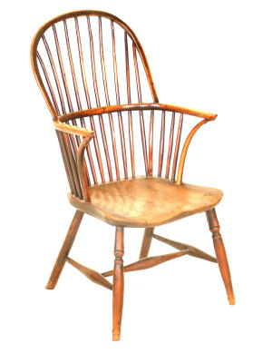 Appraisal: An elm and yew wood comb back Windsor chair th