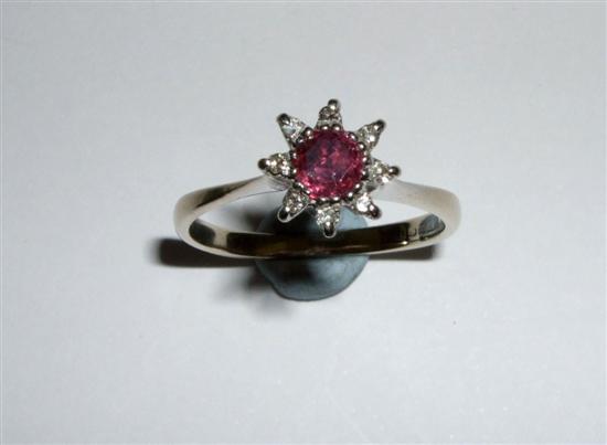 Appraisal: Ruby and diamond flowerhead cluster ring with hallmarked ct gold