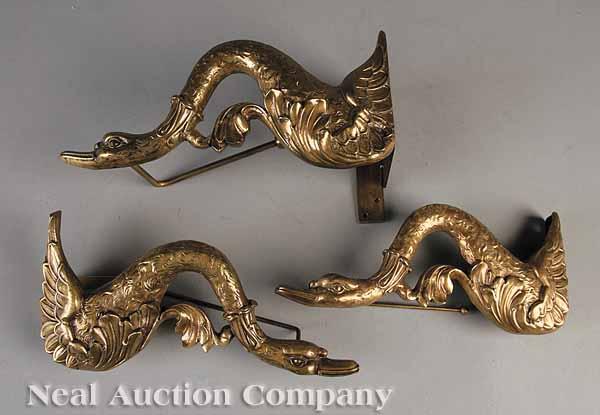 Appraisal: Three Large Swan-Form Gilt Bronze Tiebacks in the Empire Style