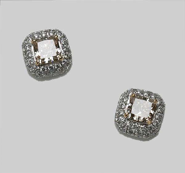 Appraisal: A pair of colored diamond and diamond earrings centering square-cut