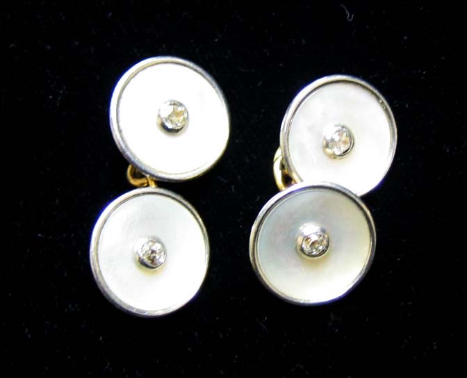 Appraisal: DIAMOND CUFFLINKS k yellow gold and platinum with bezel set