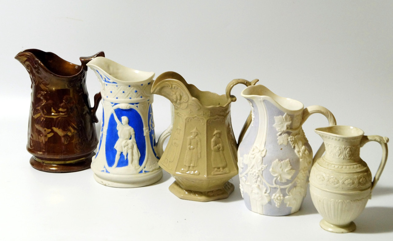 Appraisal: Various decorative jugs to include a thC English stoneware example