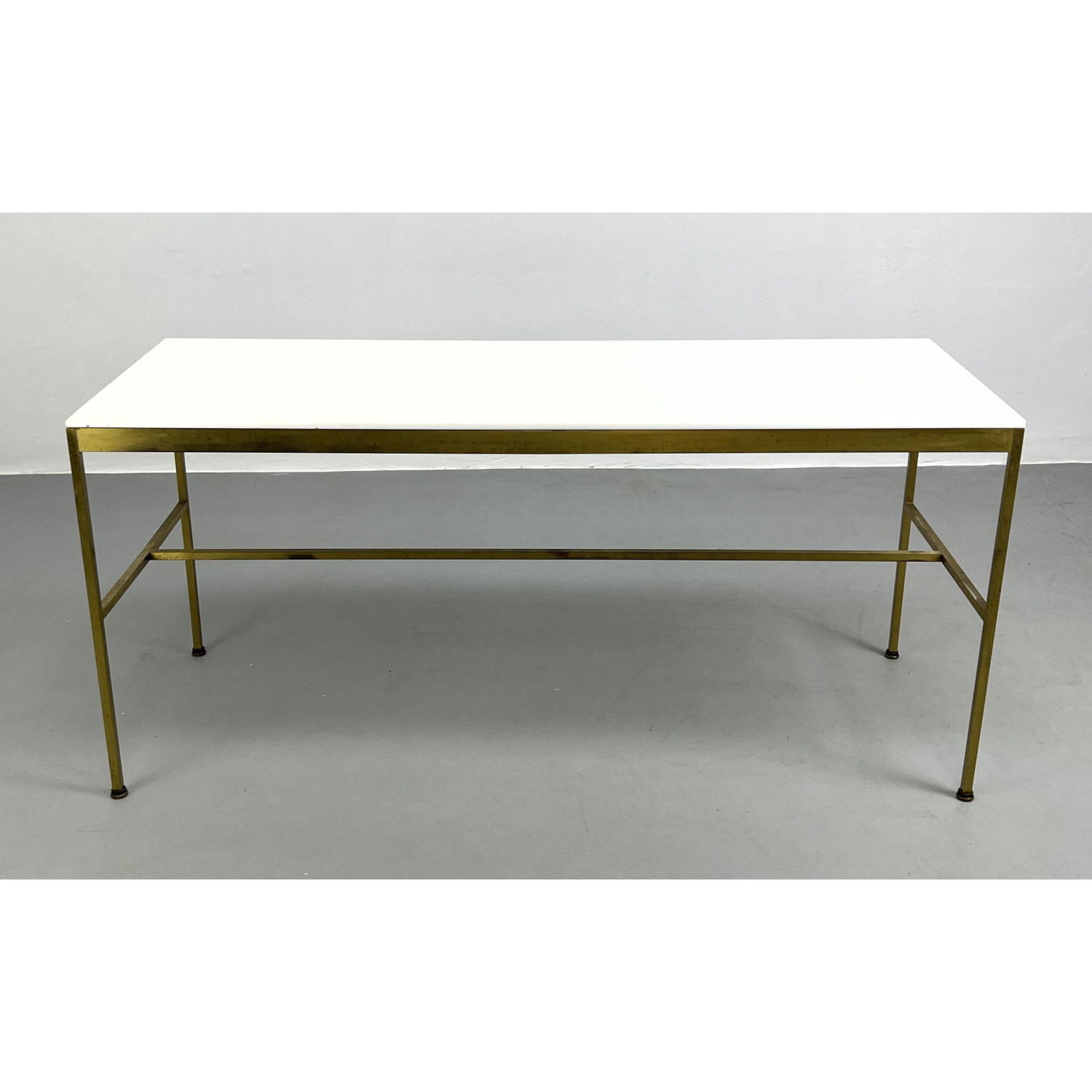 Appraisal: Paul McCobb Tall Coffee Table Brass and Vitralite glass Dimensions