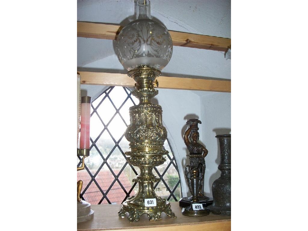 Appraisal: A good quality late th century cast brass oil lamp