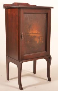 Appraisal: Mahogany record sheet music cabinet with painted door and saber