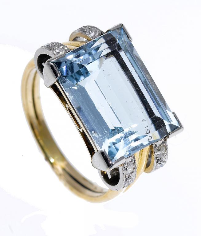 Appraisal: A BLUE ZIRCON AND DIAMOND RING the step cut zircon