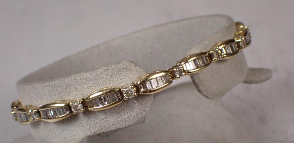 Appraisal: DIAMOND AND YELLOW GOLD TENNIS BRACELET The - k yellow