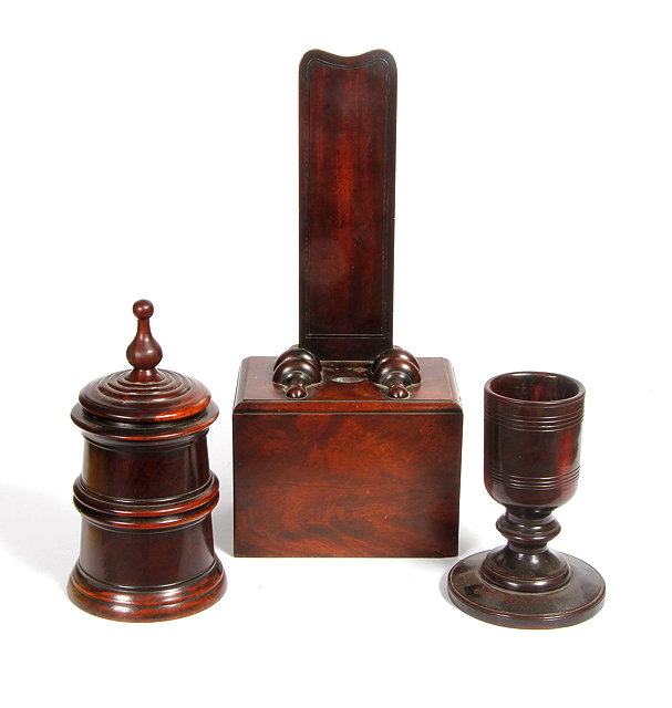 Appraisal: A LIGNUM VITAE TOBACCO JAR AND COVER of ring turned