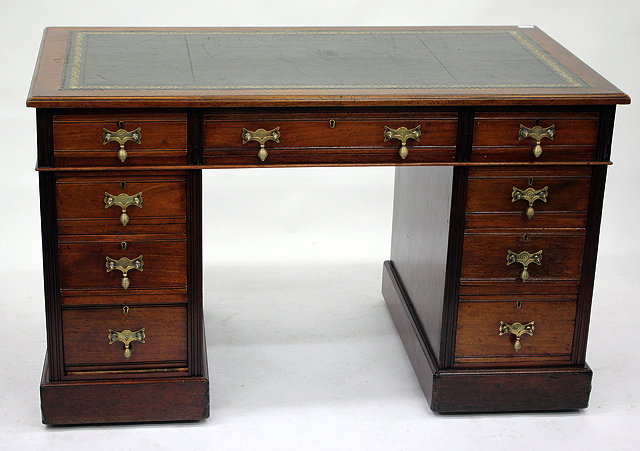 Appraisal: A VICTORIAN MAHOGANY PEDESTAL DESK with green leather inset top