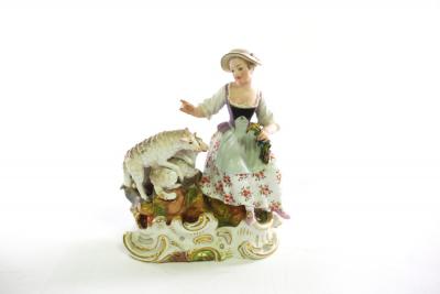 Appraisal: A Meissen group of a girl and sheep incised cm