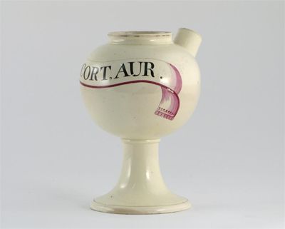 Appraisal: A creamware wet drug jar painted with a purple banner