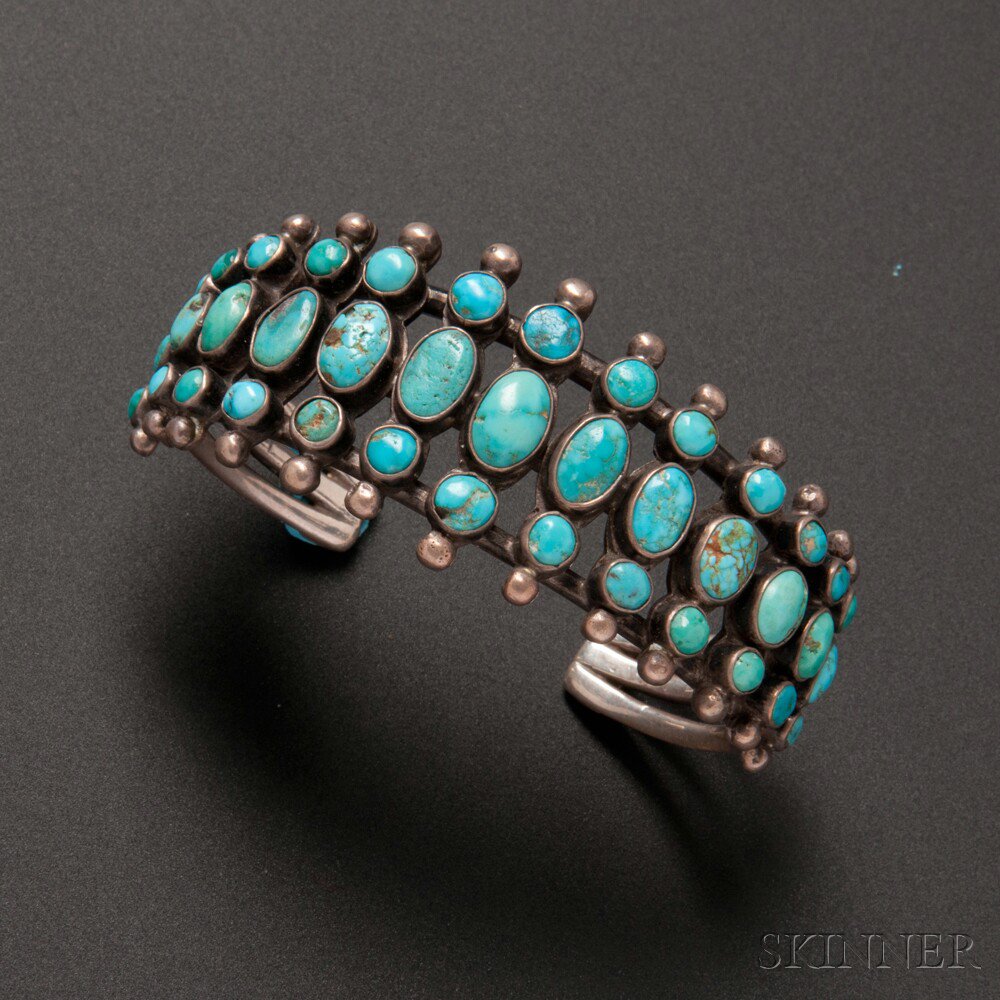 Appraisal: Zuni Silver and Turquoise Bracelet with three rows of oval