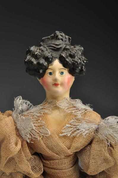 Appraisal: Early German Papier-M ch Doll Description Papier-M ch shoulder head