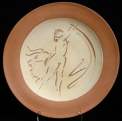 Appraisal: REUBEN NAKIAN b TERRACOTTA CHARGER Incised design on matte cream