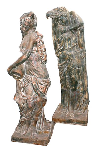 Appraisal: A pair of cast iron figures of classical women height