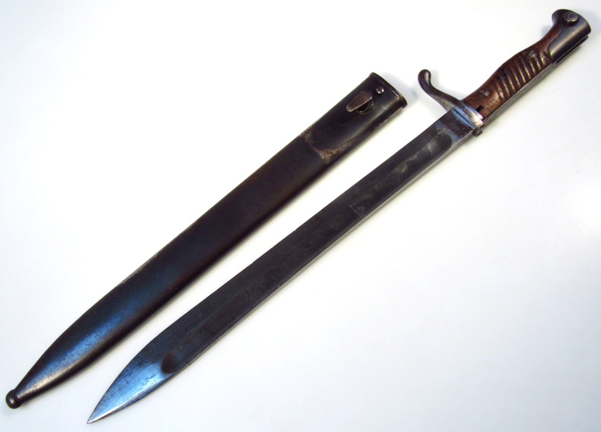 Appraisal: A Wafftnfabrik Mauser Oberndorf W bayonet with shaped blade and