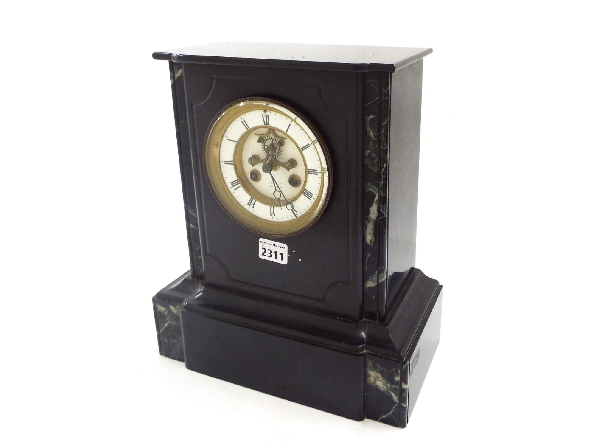 Appraisal: Black slate and green marble two train mantel clock striking