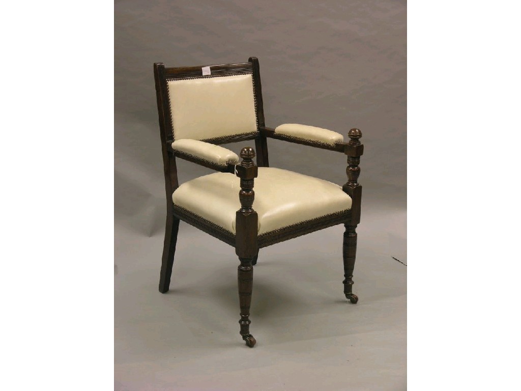 Appraisal: A mahogany framed armchair reeded frame with bulbous turned arm