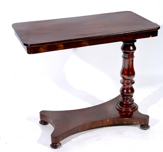 Appraisal: A TH CENTURY MAHOGANY READING TABLE with rectangular top and