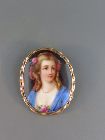 Appraisal: k Gold Brooch with Miniature Portrait of young lady on