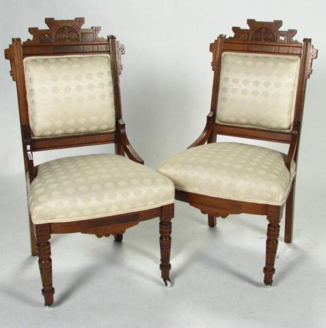 Appraisal: Pair of Walnut Eastlake Side Chairs with hip rests upholstered