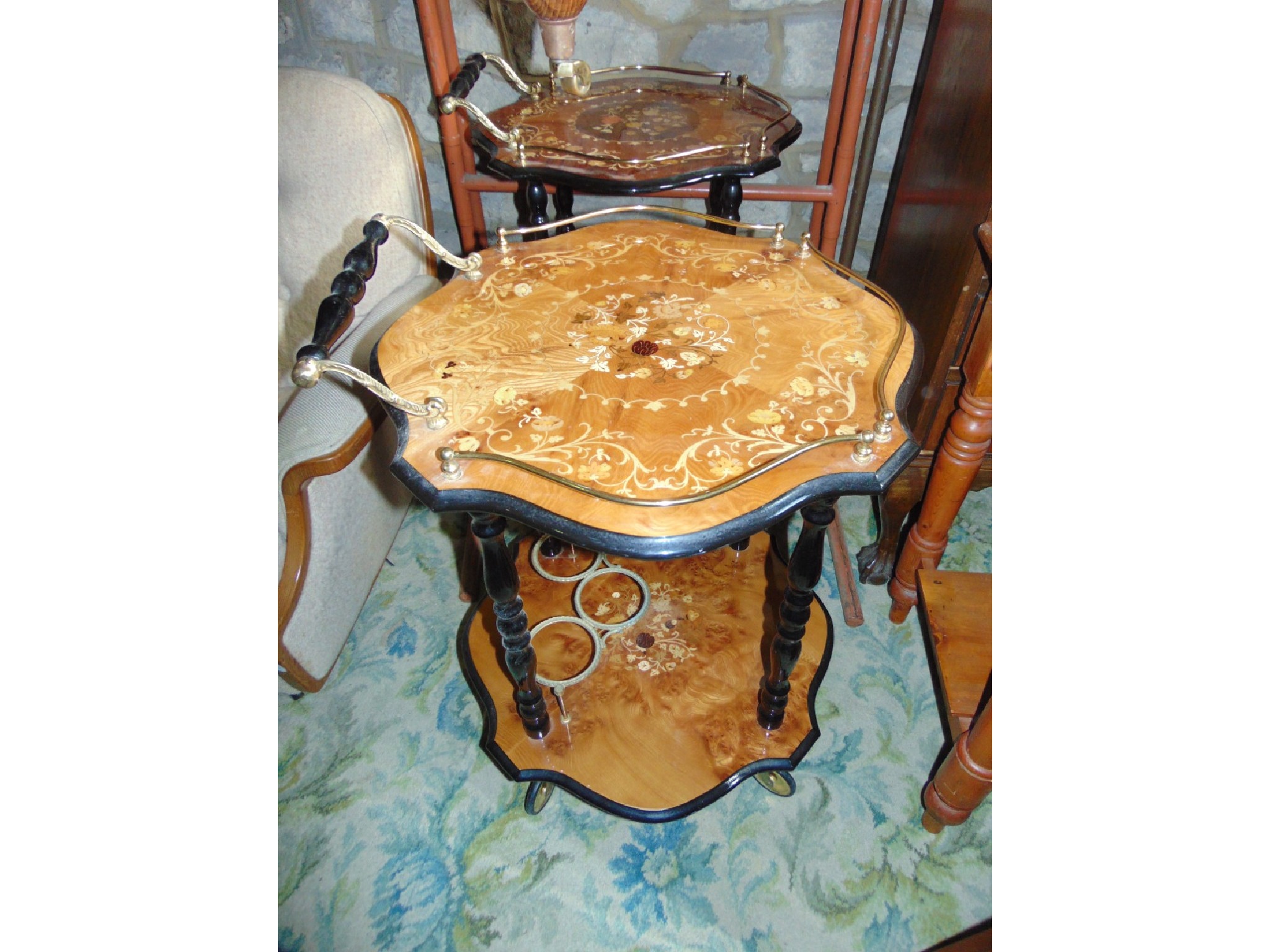 Appraisal: A matched pair of Italian two tier drinks trolley's with