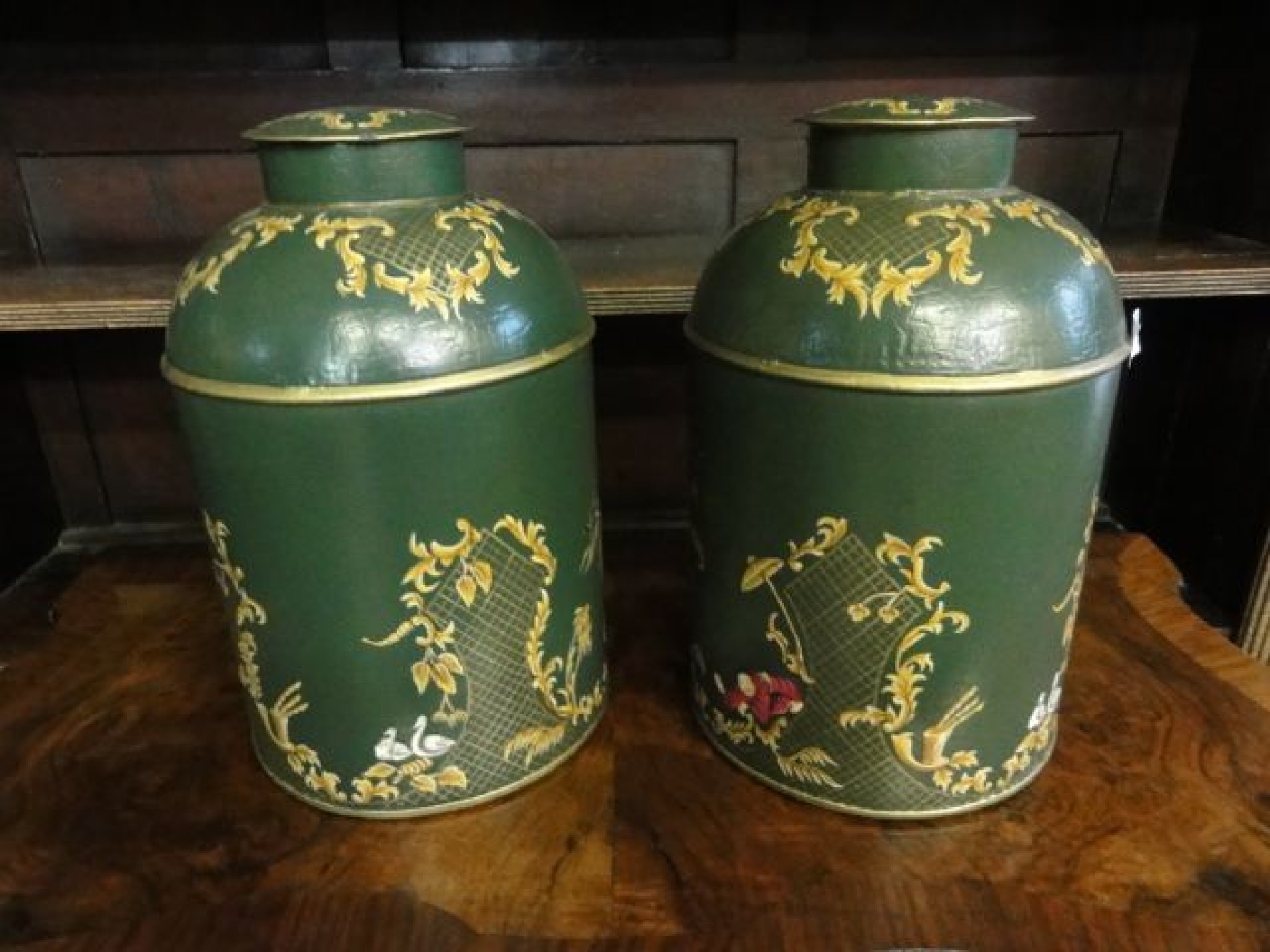 Appraisal: A pair of Victorian style tin tea canisters of cylindrical