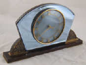 Appraisal: A stylish Art Deco mechanical mantel clock with blue engine