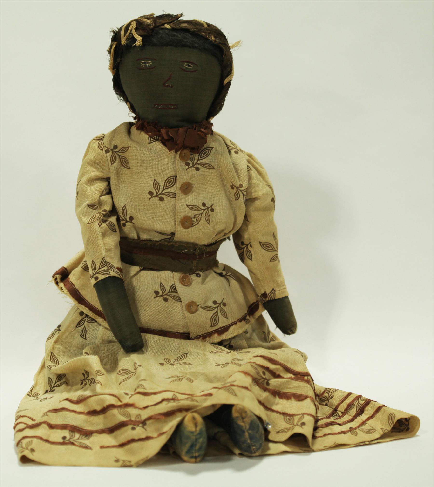 Appraisal: NINETEENTH CENTURY LARGE BLACK CLOTH DOLL This is a lovely