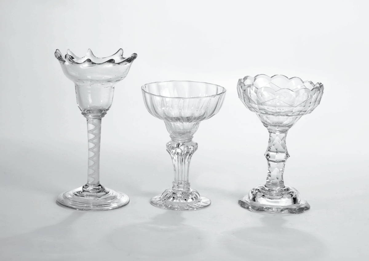 Appraisal: THREE ENGLISH FREE-BLOWN BLOWN-MOLDED AND CUT COLORLESS GLASS SWEETMEAT OR