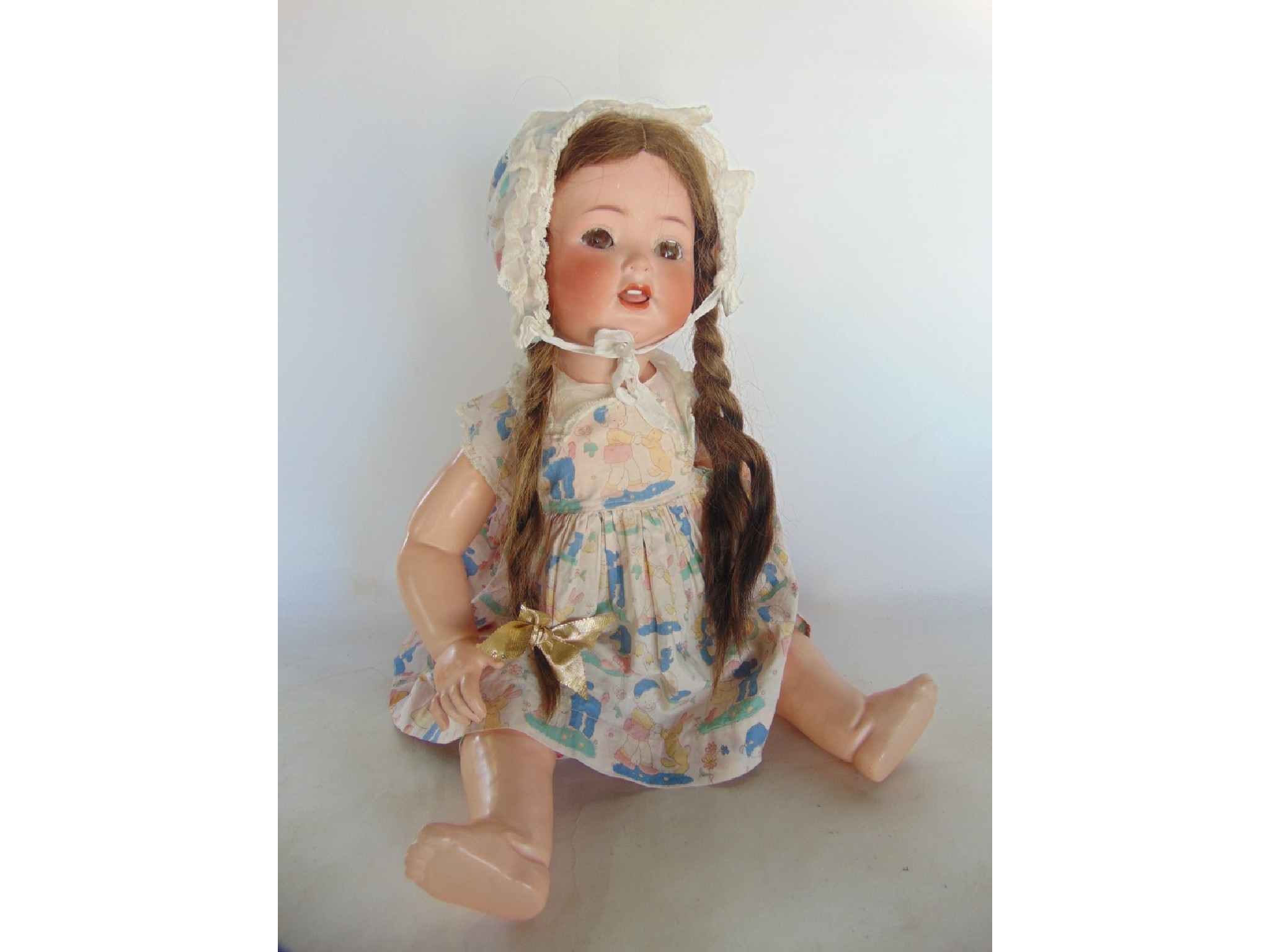 Appraisal: An antique German bisque headed doll marked Heubach Koppelsdorf Germany