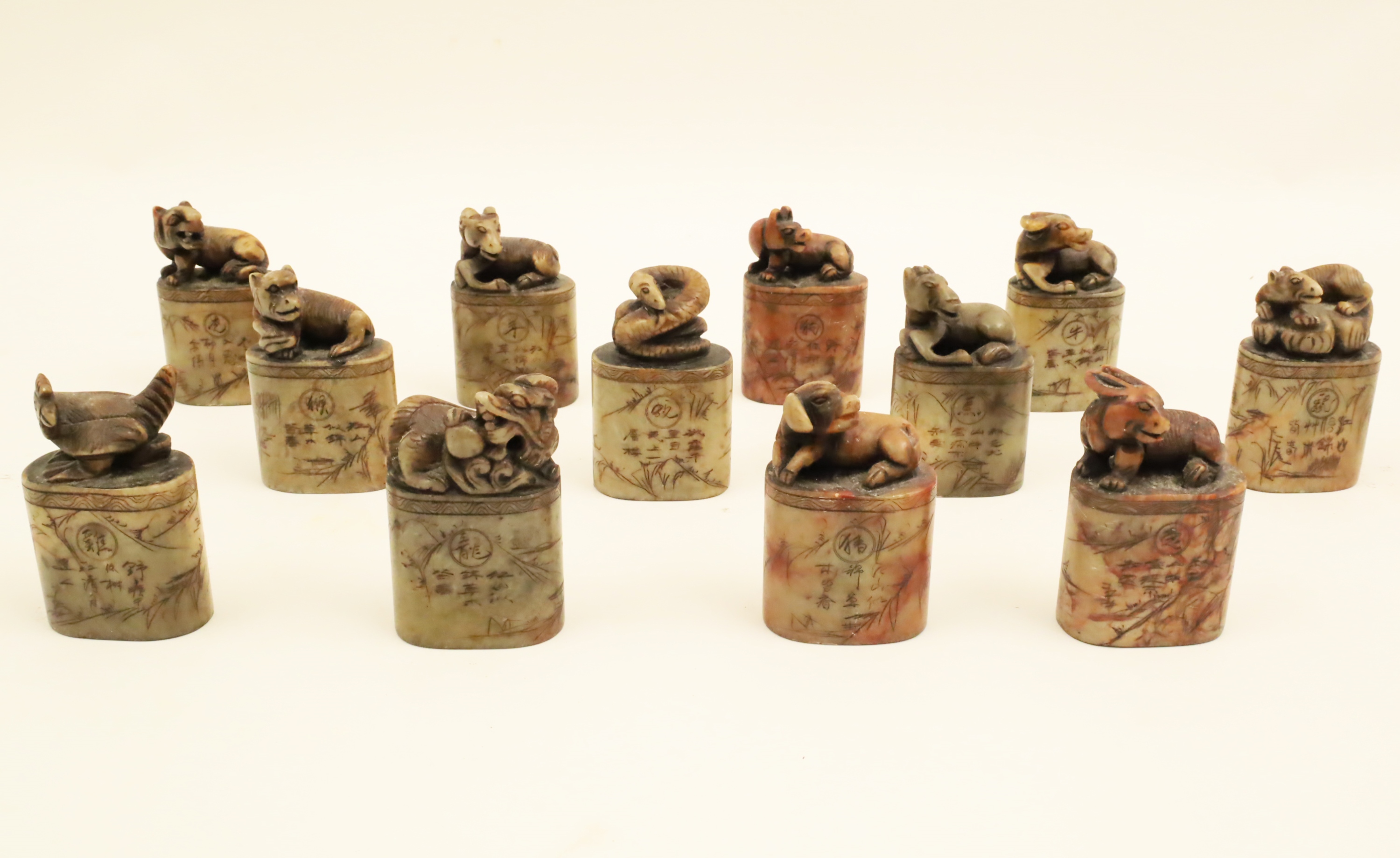 Appraisal: INDIVIDUALLY CARVED SOAPSTONE ORIENTAL SEALS Group of individually carved soapstone