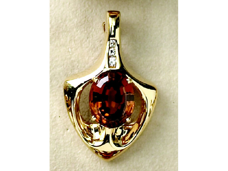 Appraisal: GEMSTONE PENDANT k yellow gold pendant set with one oval