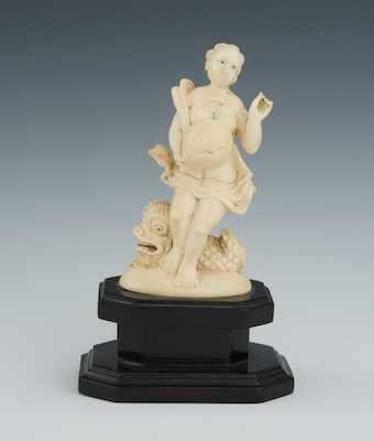 Appraisal: A Continental Carved Ivory Aphrodite with Sea Beast Group on