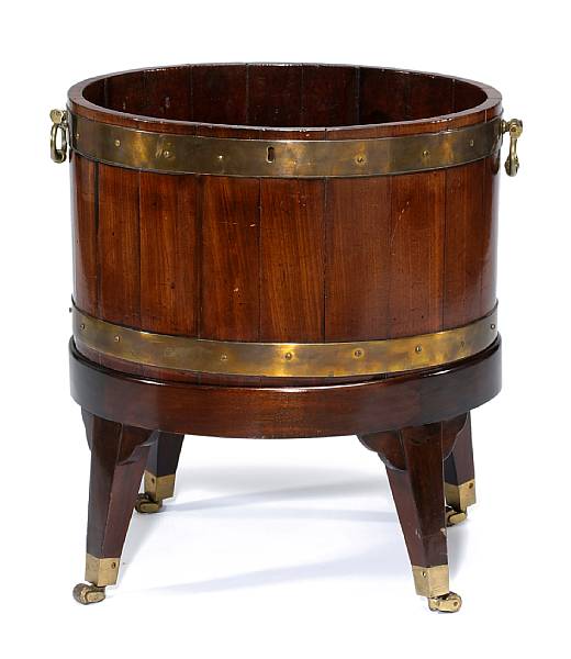 Appraisal: A George II mahogany and brass bound wine cooler on