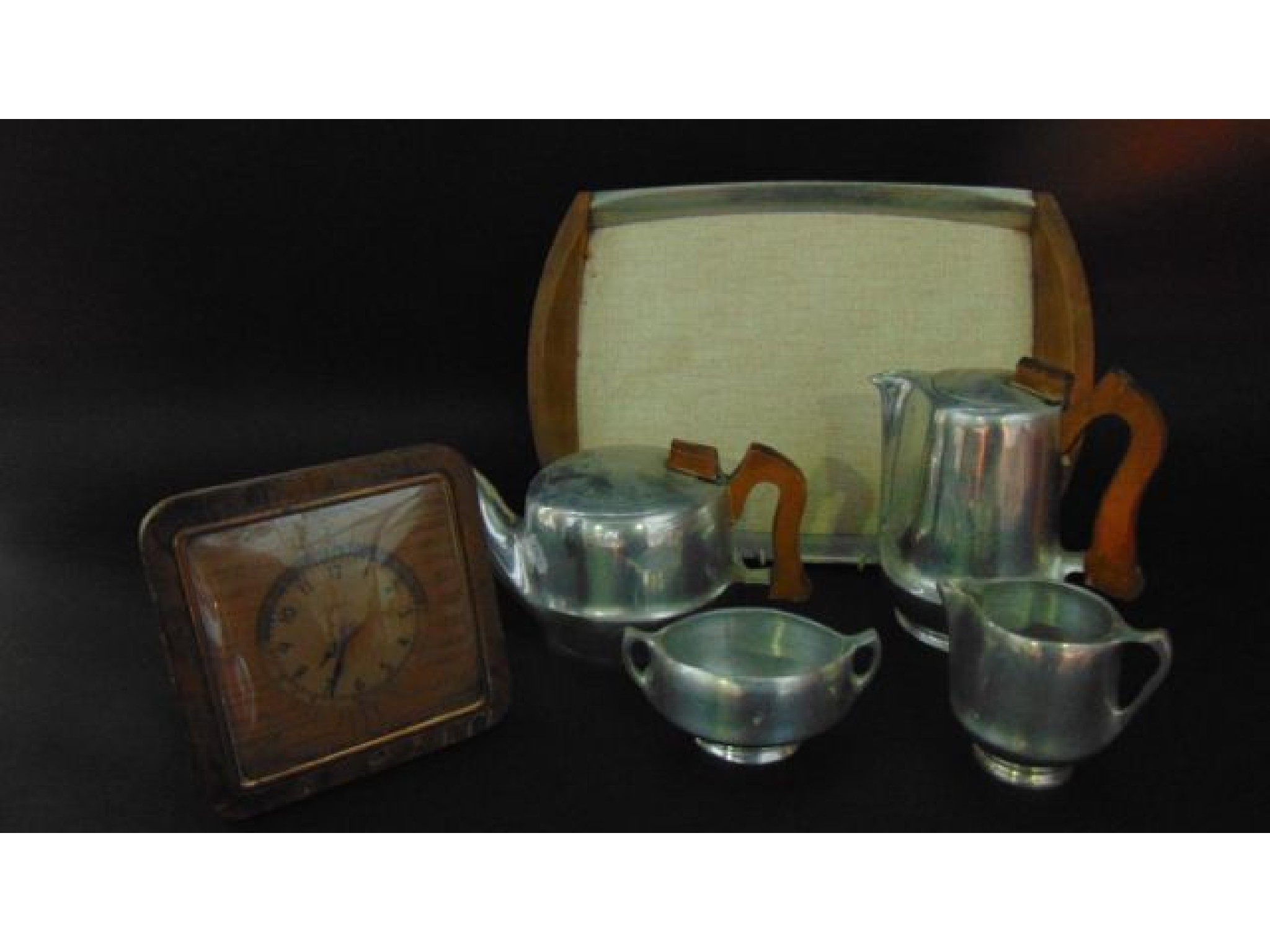 Appraisal: A five piece Picquot ware tea set comprising hot water