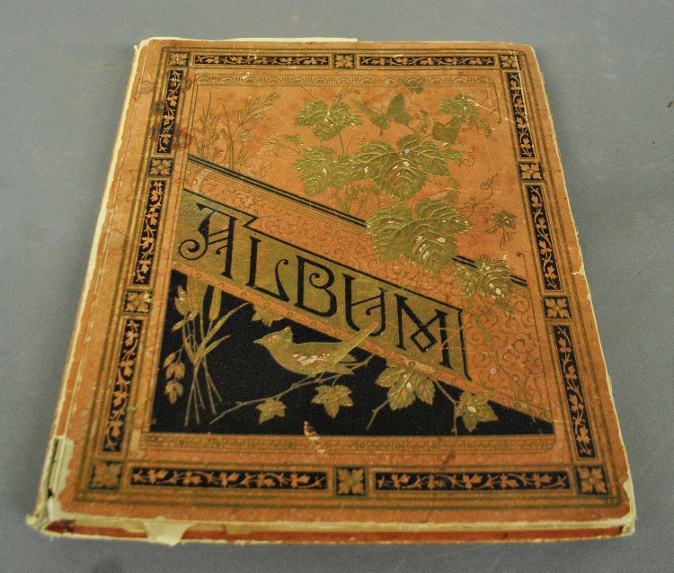 Appraisal: - Victorian album full of advertising cards cut outs etc