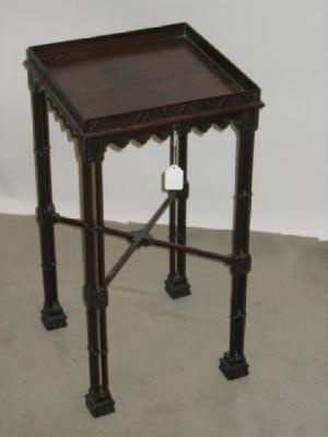 Appraisal: A MAHOGANY CHINOISERIE URN STAND of square form in the