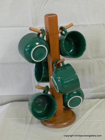 Appraisal: Forest Green Coffee - Tea Cup Set with Mug Tree