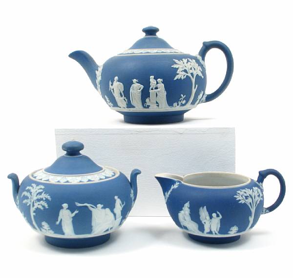 Appraisal: A Wedgwood jasperware tea set comprising a teapot creamer and