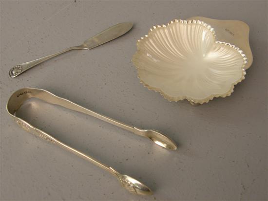 Appraisal: William IV silver sugar tongs London scallop shaped silver dish