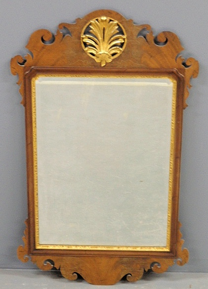 Appraisal: - Chippendale style mahogany framed mirror with a gilt crest