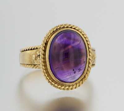 Appraisal: An English Gold and Amethyst Ring k yellow gold ring