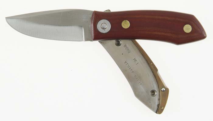 Appraisal: BARRY WOOD PATENTED FOLDING KNIFE Made with steel lined red