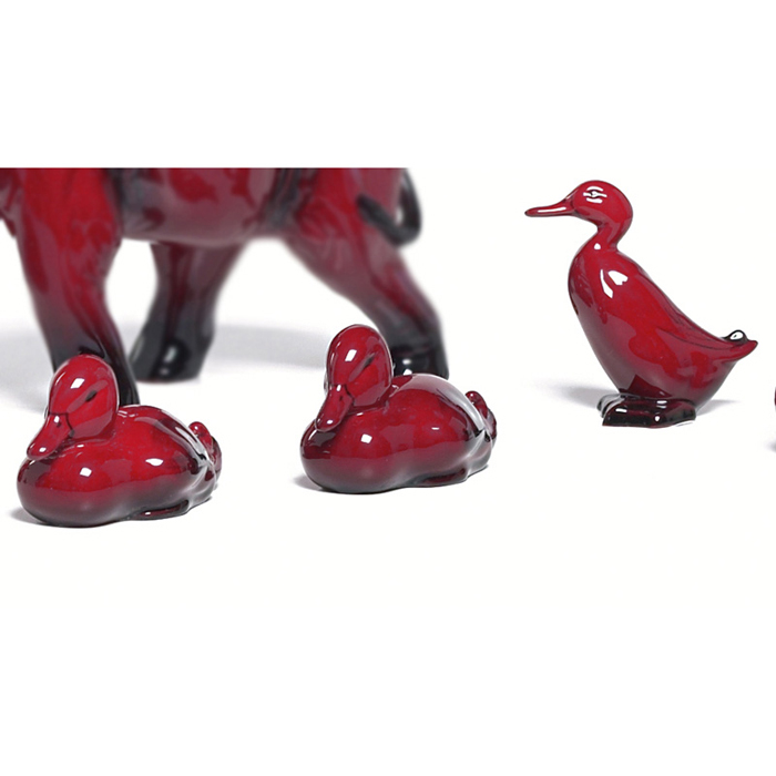 Appraisal: Royal Doulton figurines three ducks all covered in a red