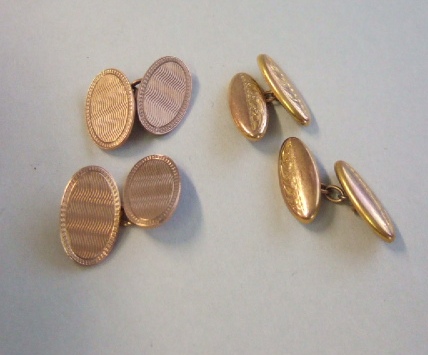 Appraisal: A pair of ct gold oval cufflinks with engine turned