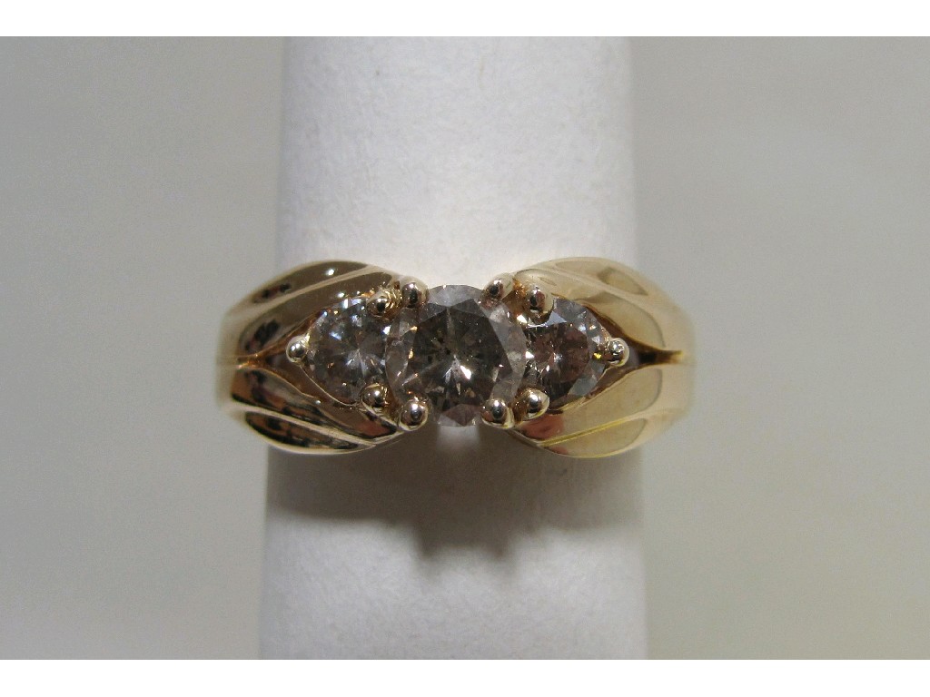 Appraisal: Eighteen carat gold diamond three stone ring with brilliant cut