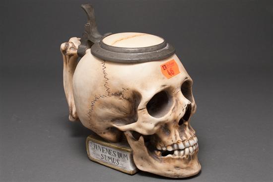 Appraisal: German pewter-mounted painted bisque skull-form stein of litre capacity probably