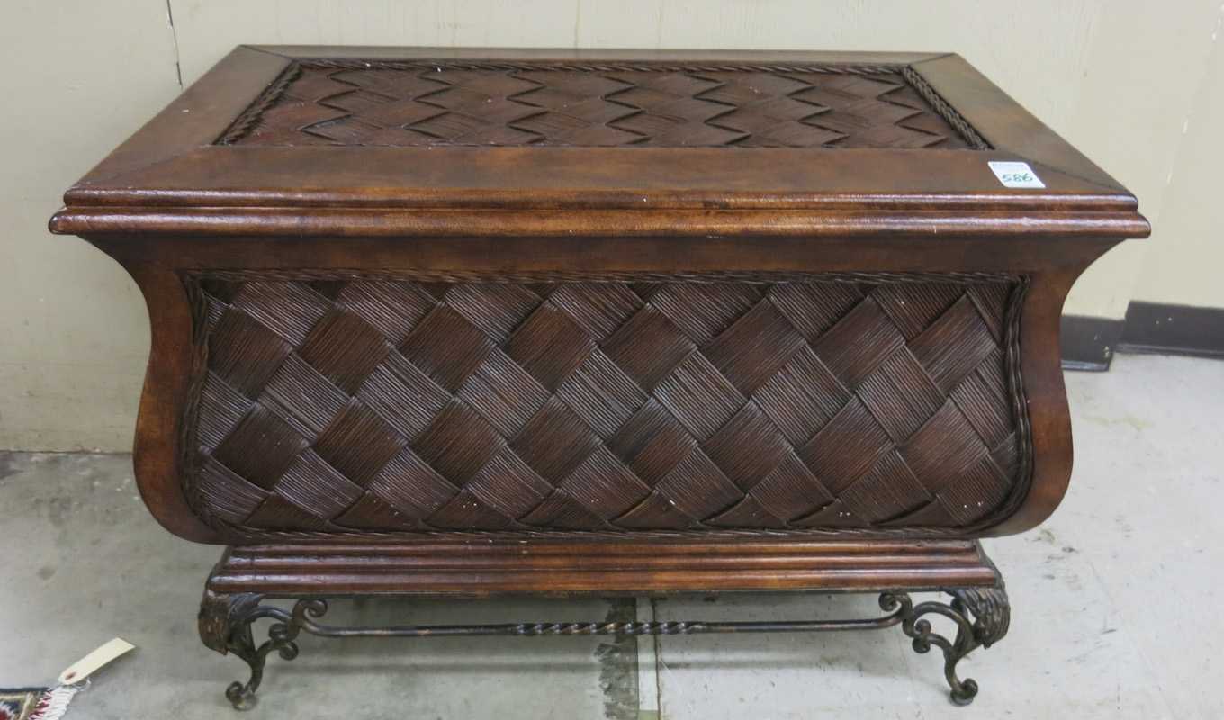 Appraisal: LIFT TOP BOMBE STORAGE CHEST of wood leather and wicker