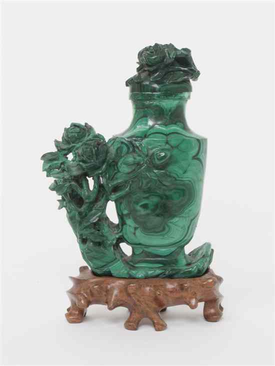 Appraisal: A Carved Malachite Lidded Vase with Peonies the vase of